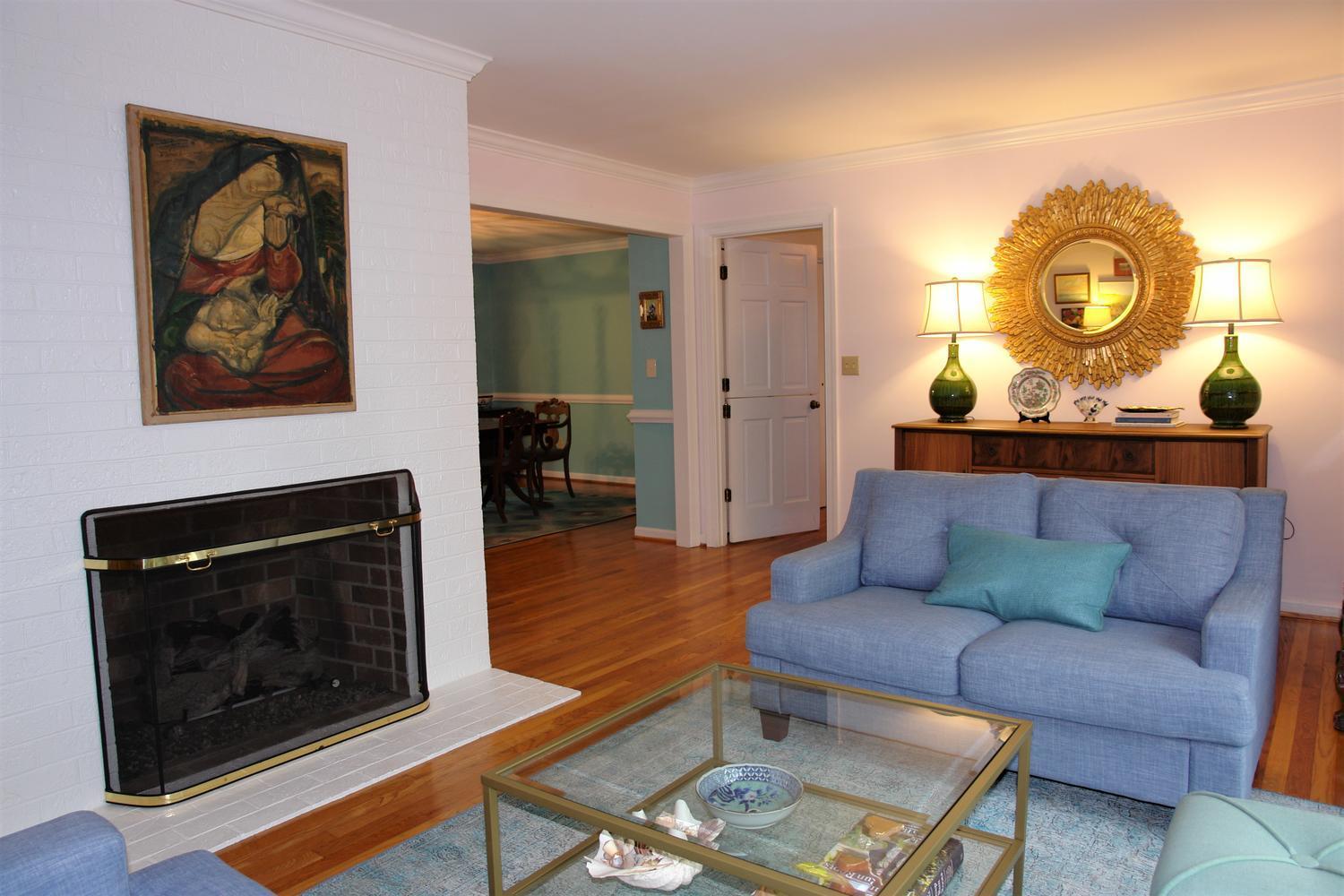 219 Darwin Road Southwest Roanoke, VA 24014 - Photo 9 of 58 a living room with furniture and a fireplace