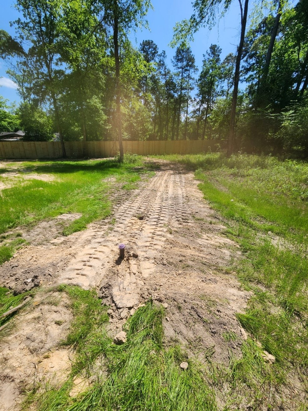 150 Pine Lane Shepherd, TX 77371 - Photo 7 of 13 a view of lake with green space
