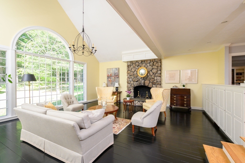 451 Main Street Norwell, MA 02061 - Photo 11 of 31 a living room with fireplace furniture and a large window
