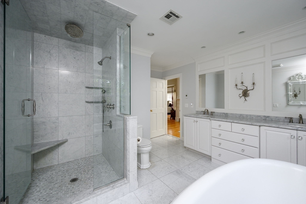 451 Main Street Norwell, MA 02061 - Photo 22 of 31 a bathroom with a sink a toilet and shower