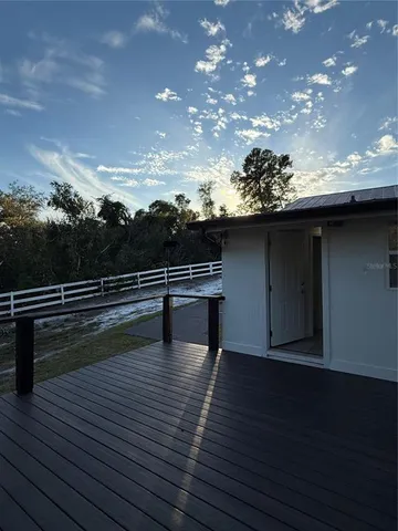 a view of outdoor space with hardwood floor
