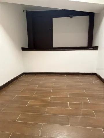 a living room with a wooden floor