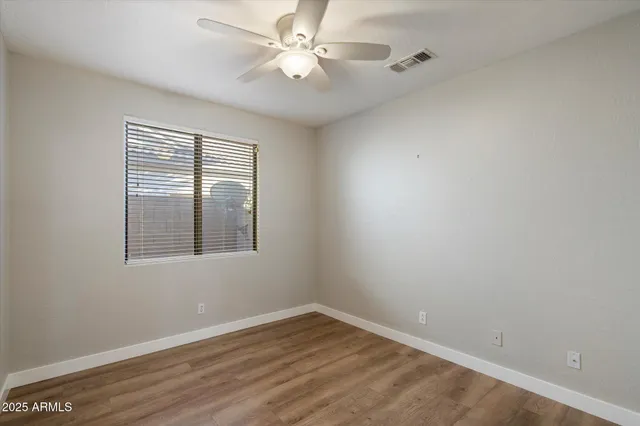 a spacious bathroom with a double vanity sink mirror and