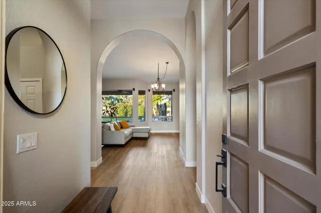 a aerial view of a house with a yard