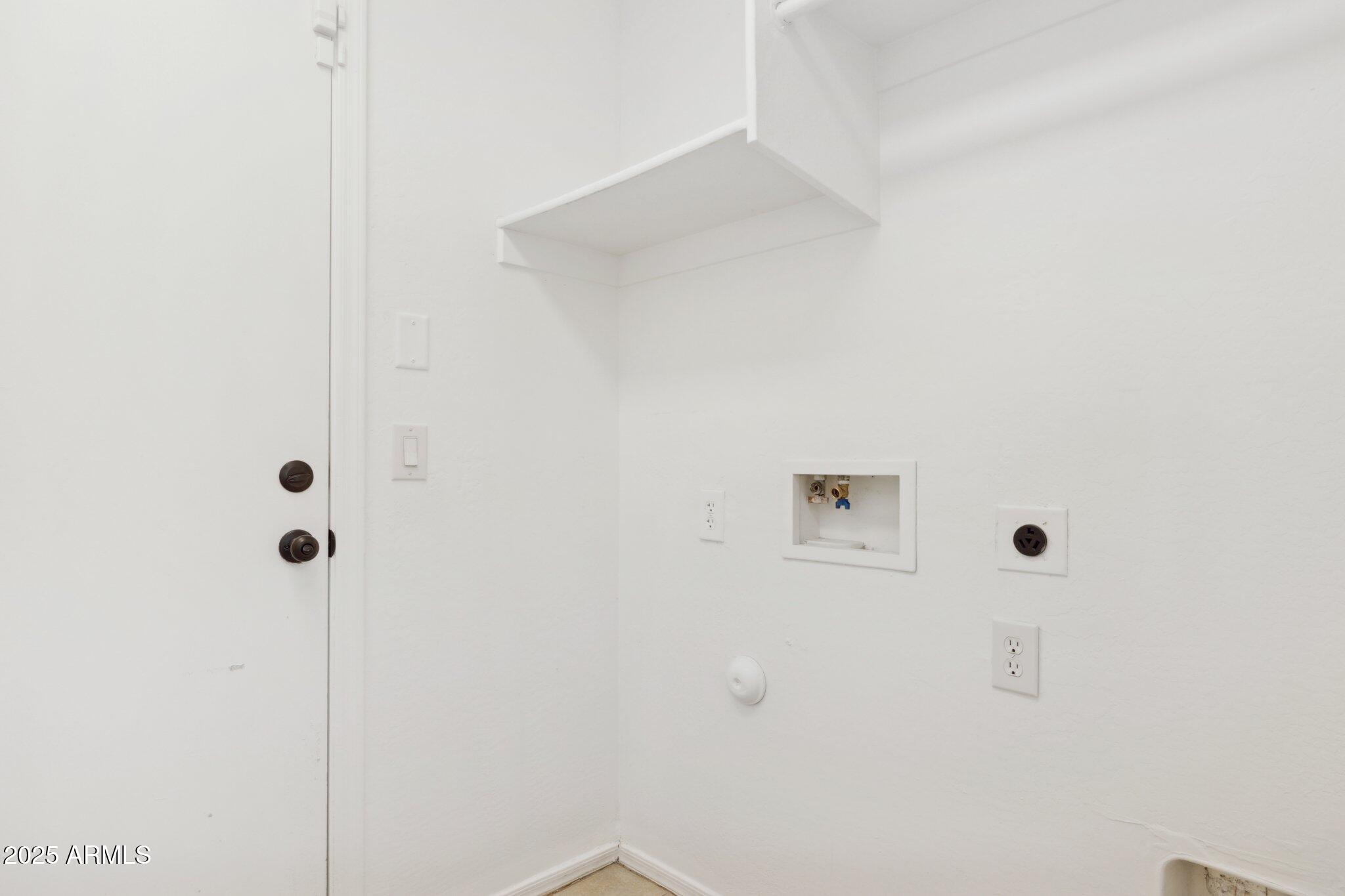 9951 West Bloch Road Tolleson, AZ 85353 - Photo 21 of 33 a bathroom with a shower