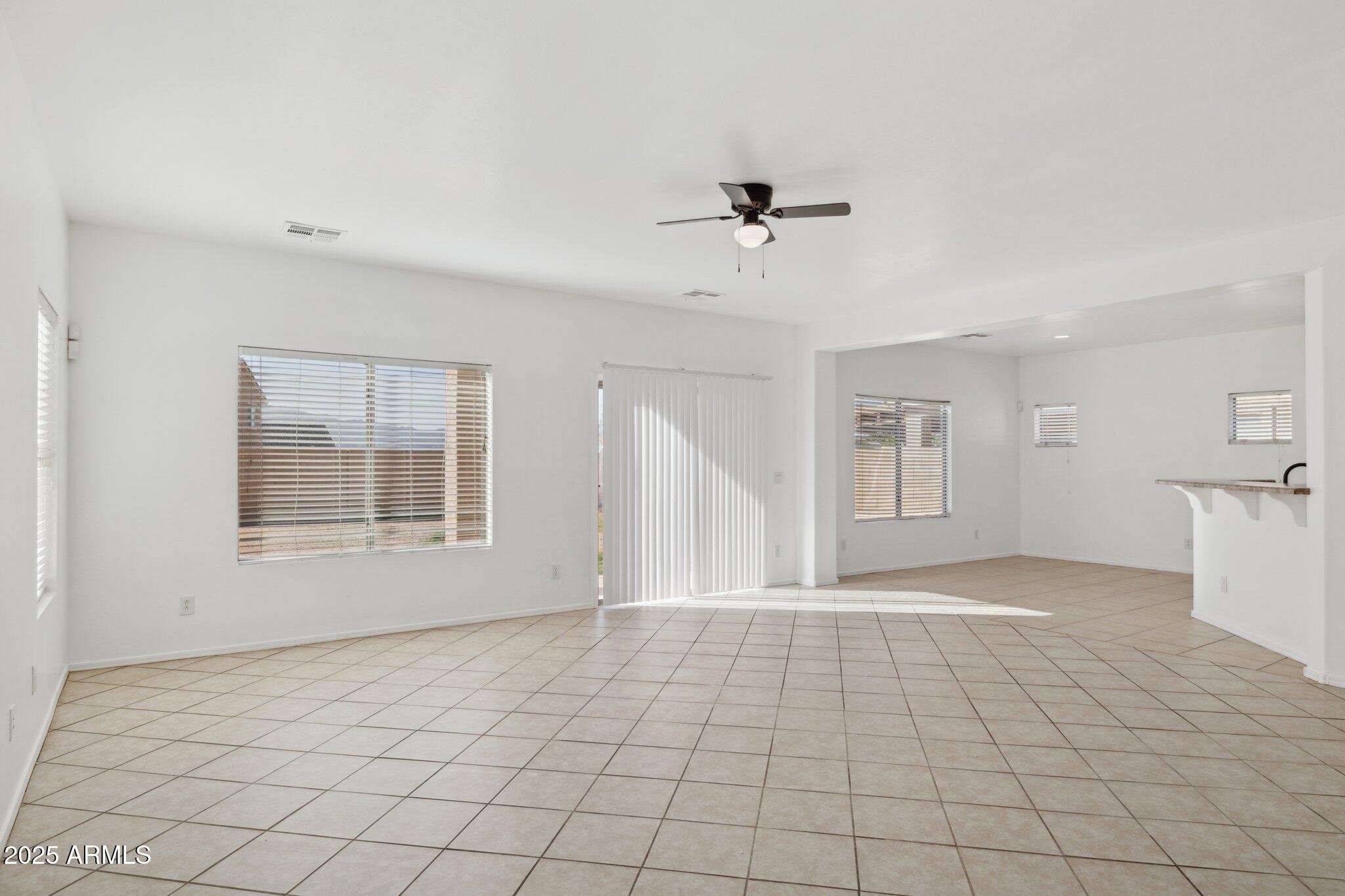 9951 West Bloch Road Tolleson, AZ 85353 - Photo 2 of 33 a view of an empty room with a window