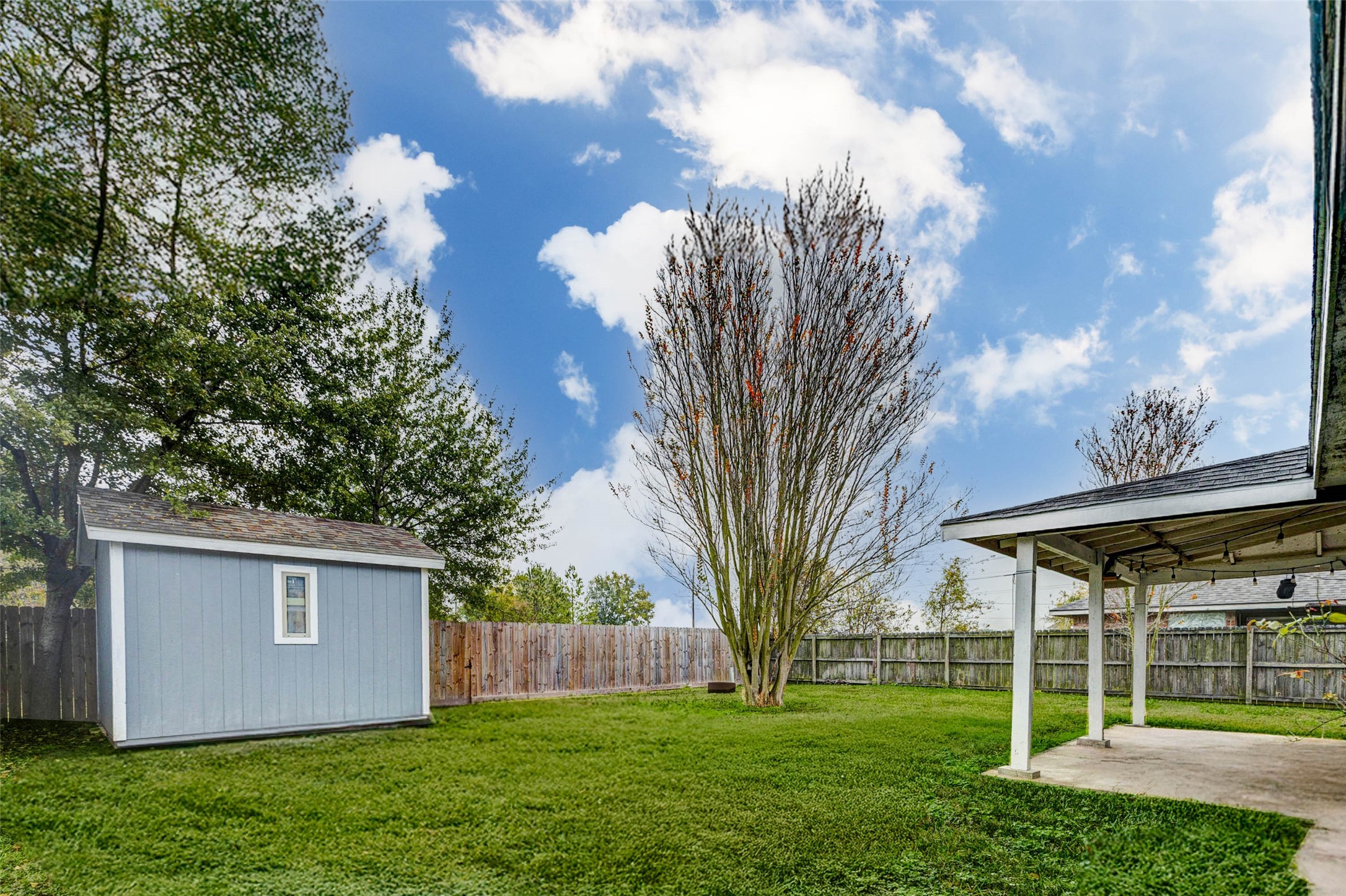 13614 Sablegrove Lane Houston, TX 77014 - Photo 21 of 22 Covered patio and tough shed