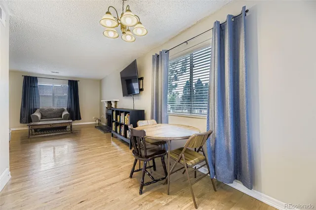 a bedroom with a bed closet and mirror