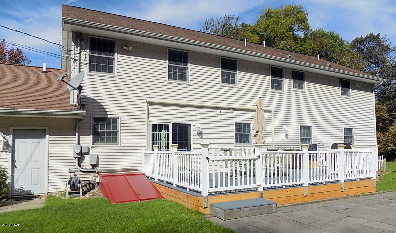 58 Callapoose Road Moscow, PA 18444 - Photo 9 of 98 Rear Deck w/Sunsetter Awning!