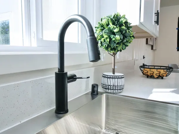 a vase of flowers sitting on a table