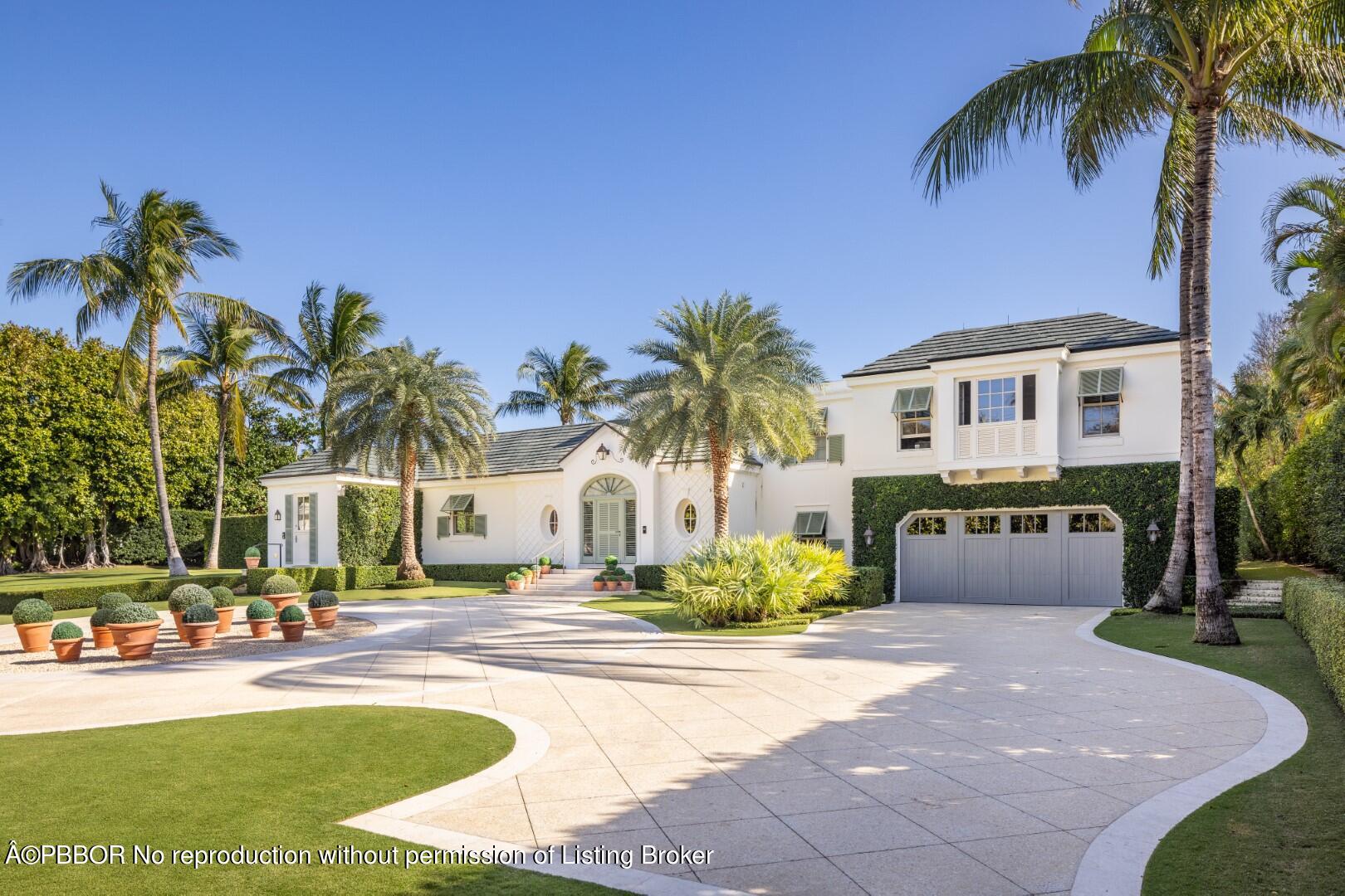 710 South County Road Palm Beach, FL 33480 - Photo 13 of 69 a front view of a house with swimming pool and sitting area