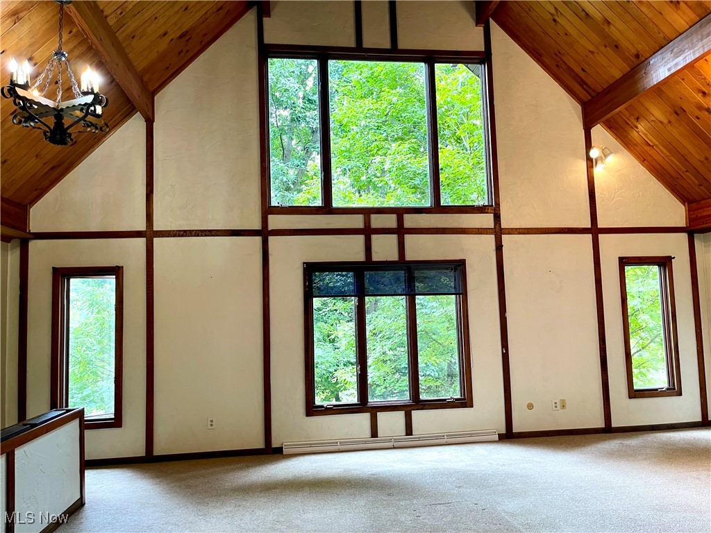 6518 Stonecreek Road Southwest Newcomerstown, OH 43832 - Photo 6 of 42 Great Room 22 ft. at the peak with wooded view