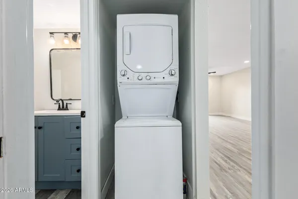 a bathroom with a toilet and a sink