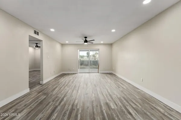 a view of an empty room and window