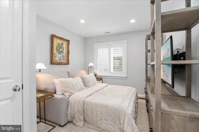 a room with a window and a chair