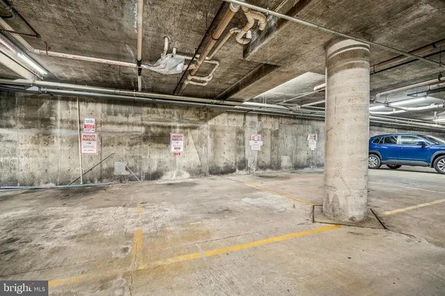 front view of a brick house with a windows