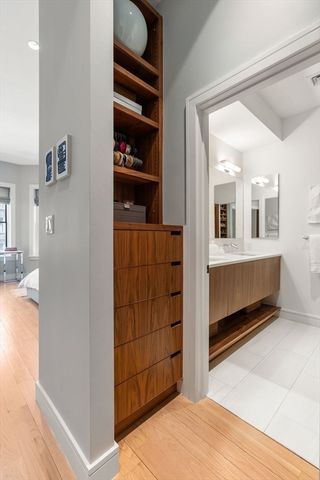 a view of entryway livingroom and hall with wooden floor