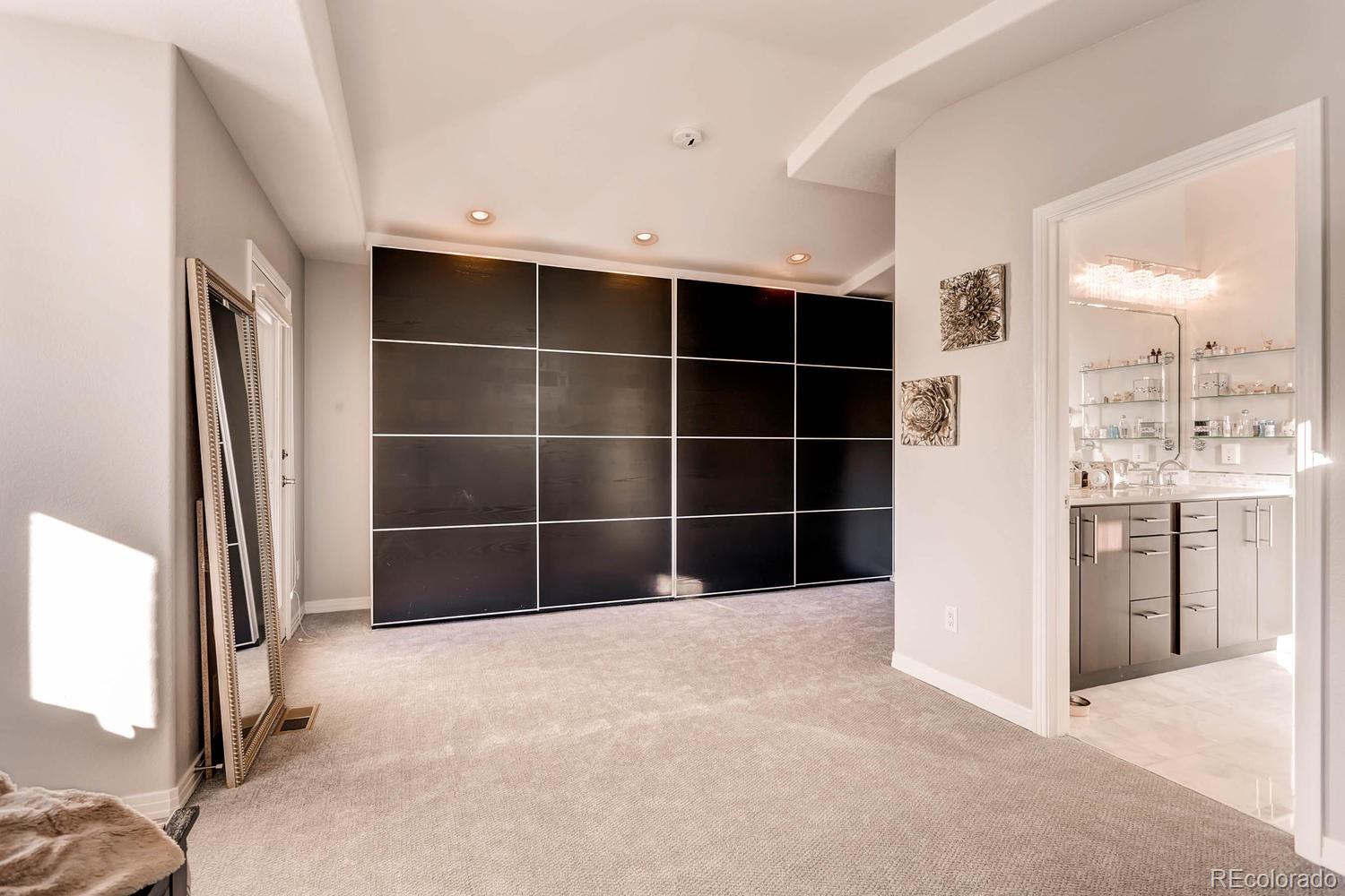 244 South Monroe Street Denver, CO 80209 - Photo 18 of 35 a view of an empty room with a window