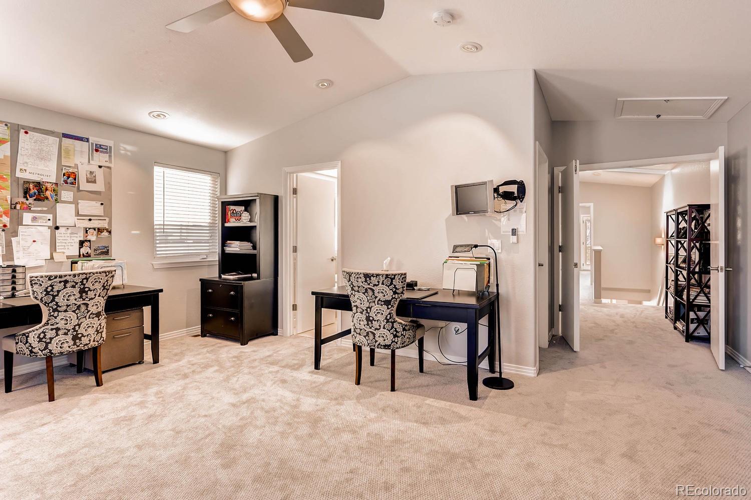 244 South Monroe Street Denver, CO 80209 - Photo 22 of 35 a dining room with furniture and a kitchen