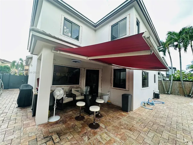 a view of a house with patio