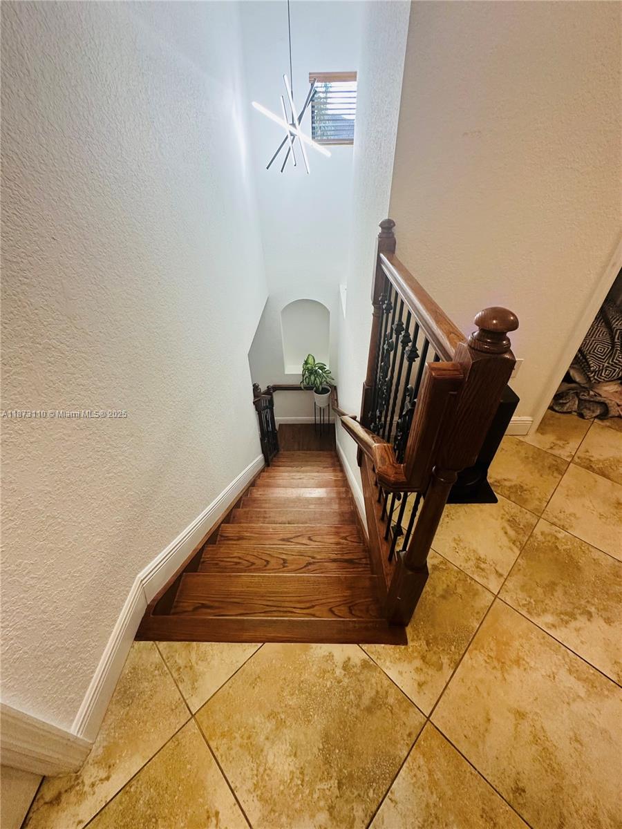 1608 Southwest 154th Court Miami, FL 33185 - Photo 7 of 22 a view of wooden floor in a room