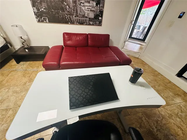 a living room with furniture and a couch