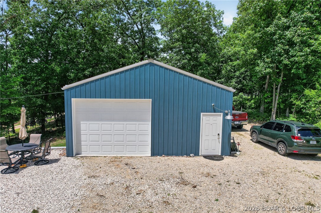 27444 Golden Beach Road Barnett, MO 65011 - Photo 24 of 42 RV parking along right side of home