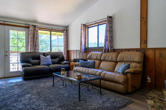 a kitchen with a sink a stove and cabinets