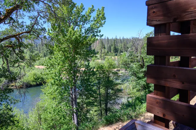 a outdoor space with a table and chairs