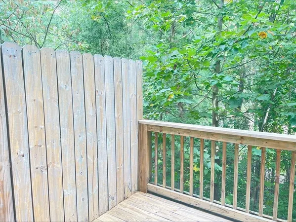 a view of a wooden fence