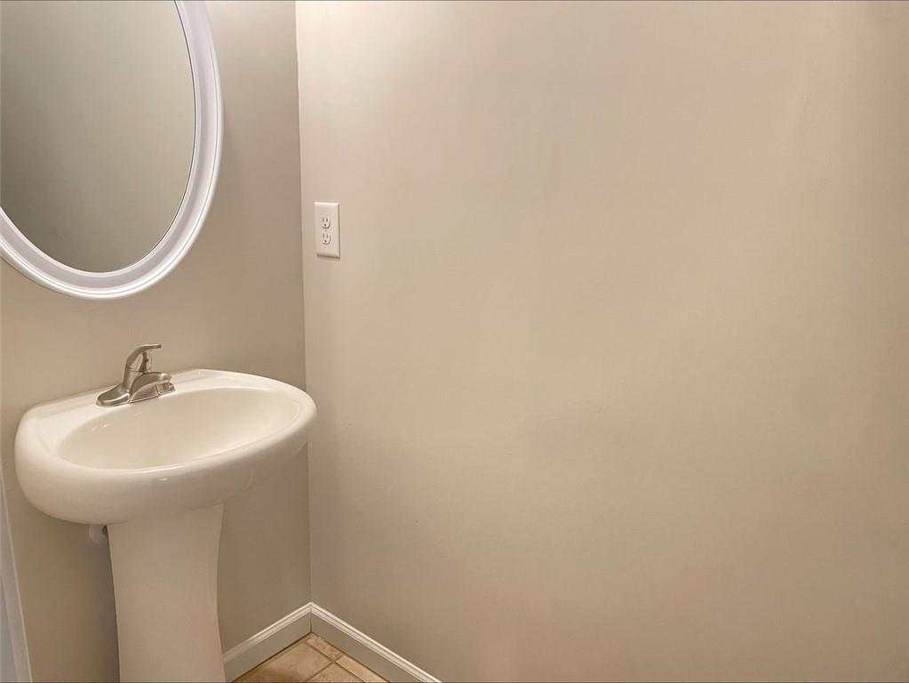 Undisclosed Address Norcross, GA 30093 - Photo 9 of 18 a bathroom with a sink and a mirror