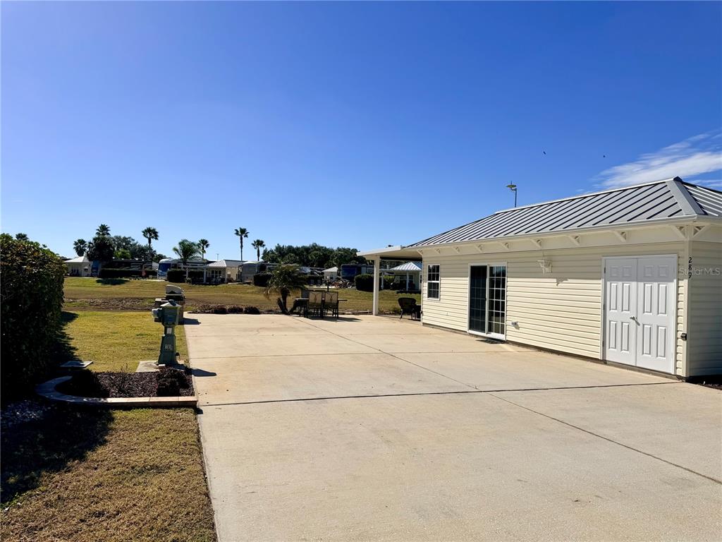 9404 Southeast 49th Terrace Webster, FL 33597 - Photo 3 of 42 a house view with a ocean view