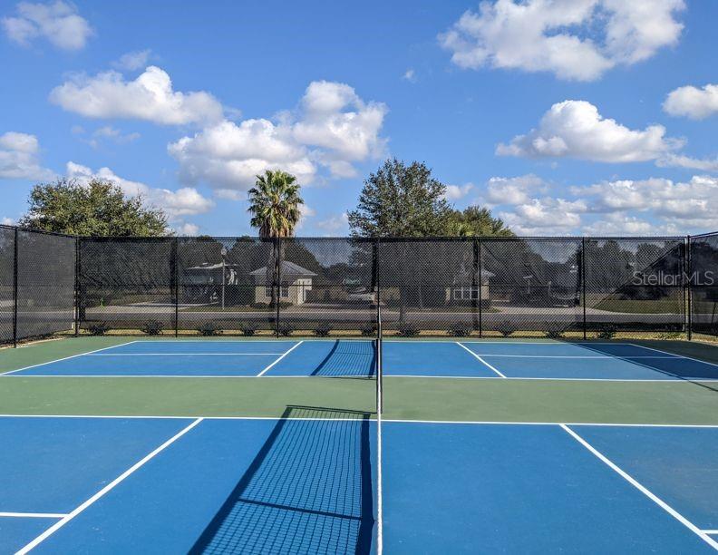 9404 Southeast 49th Terrace Webster, FL 33597 - Photo 35 of 42 a view of a tennis court