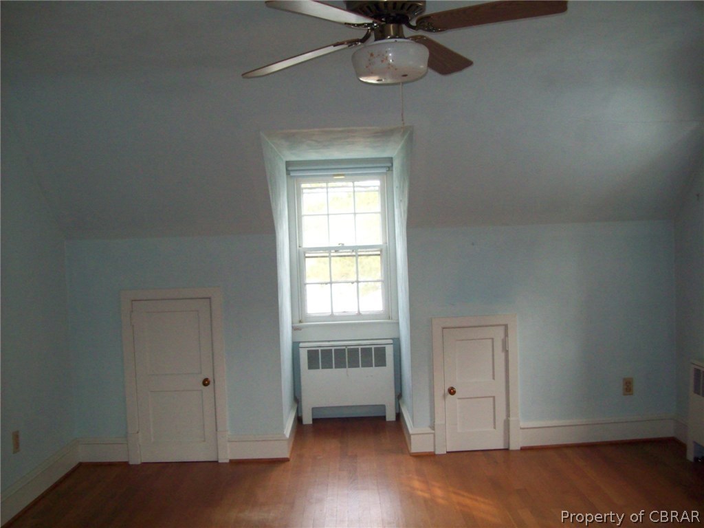 477 Rains Lane Cardinal, VA 23025 - Photo 25 of 30 2nd story bedroom picture of one end, large room with lots of storage