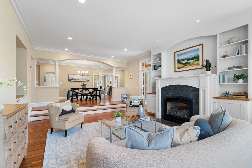 209 Waltham Street Lexington, MA 02421 - Photo 11 of 39 a living room with furniture and a fireplace