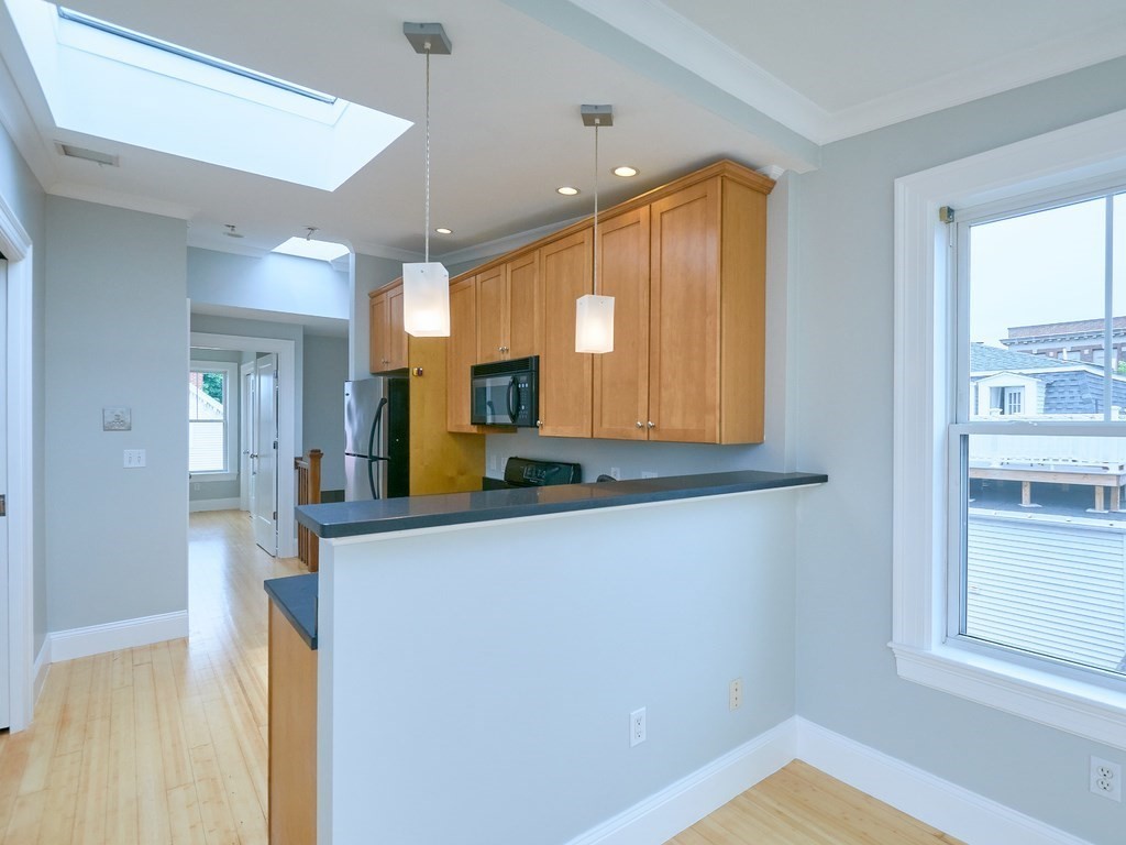 3 Leeds Street, Unit 3 Boston, MA 02127 - Photo 14 of 27 a view of a kitchen with a window