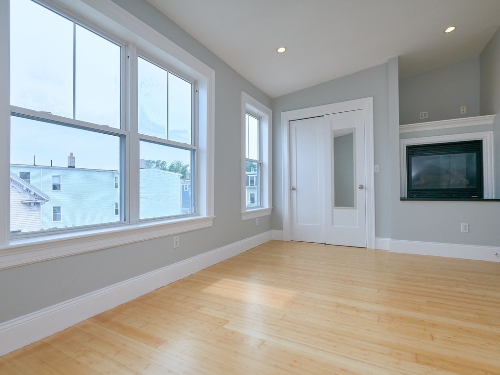 3 Leeds Street, Unit 3 Boston, MA 02127 - Photo 16 of 27 a view of an empty room with a window