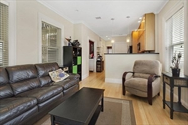 3 Leeds Street, Unit 3 Boston, MA 02127 - Photo 4 of 27 a living room with furniture and a couch