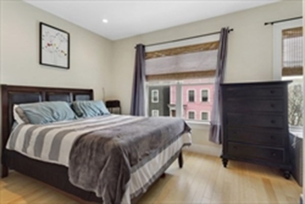 3 Leeds Street, Unit 3 Boston, MA 02127 - Photo 6 of 27 a bedroom with a bed and a dresser