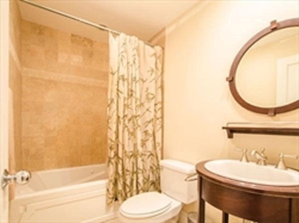 3 Leeds Street, Unit 3 Boston, MA 02127 - Photo 7 of 27 a bathroom with a sink a toilet and a mirror