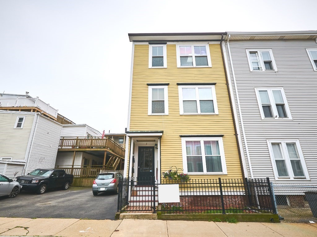 3 Leeds Street, Unit 3 Boston, MA 02127 - Photo 10 of 27 a view of a building with car parked