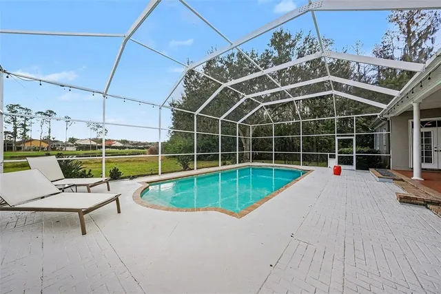 a view of a house with a swimming pool
