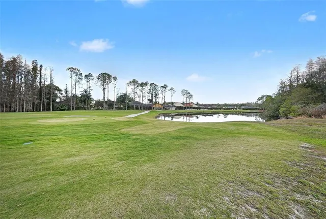 a view of a large building with a big yard