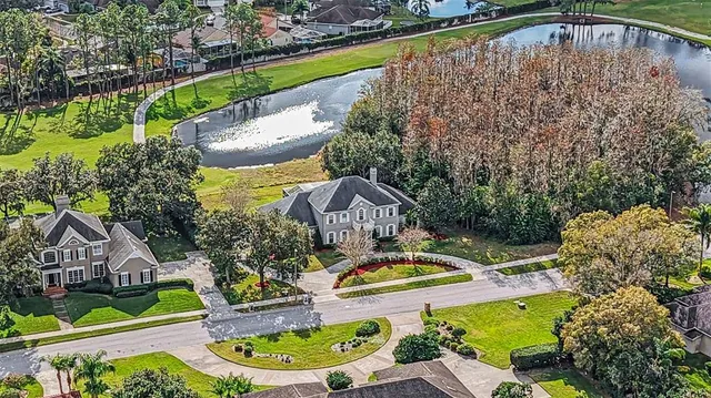 a view of swimming pool with outdoor seating and yard