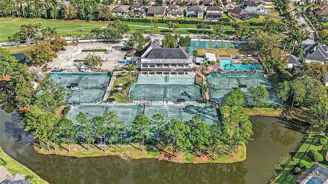 a view of a lake with a building in the background