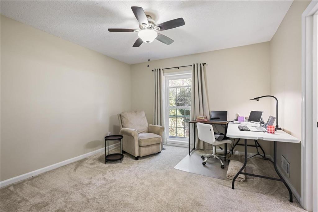 4505 Cochran Mill Road Fairburn, GA 30213 - Photo 25 of 36 a workspace with a window