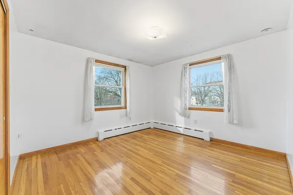 a view of an empty room and window