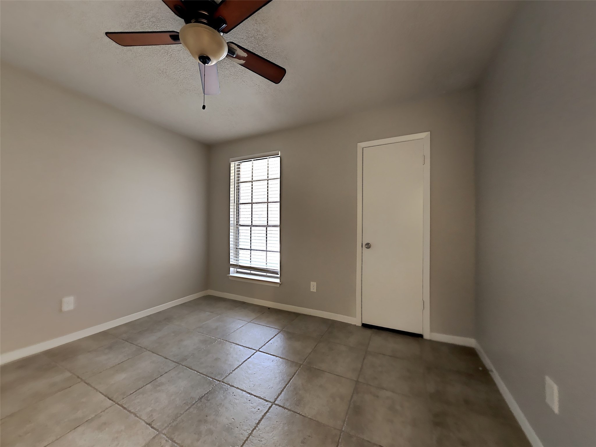 23926 Spring Day Lane Spring, TX 77373 - Photo 13 of 19 a view of an empty room with a window