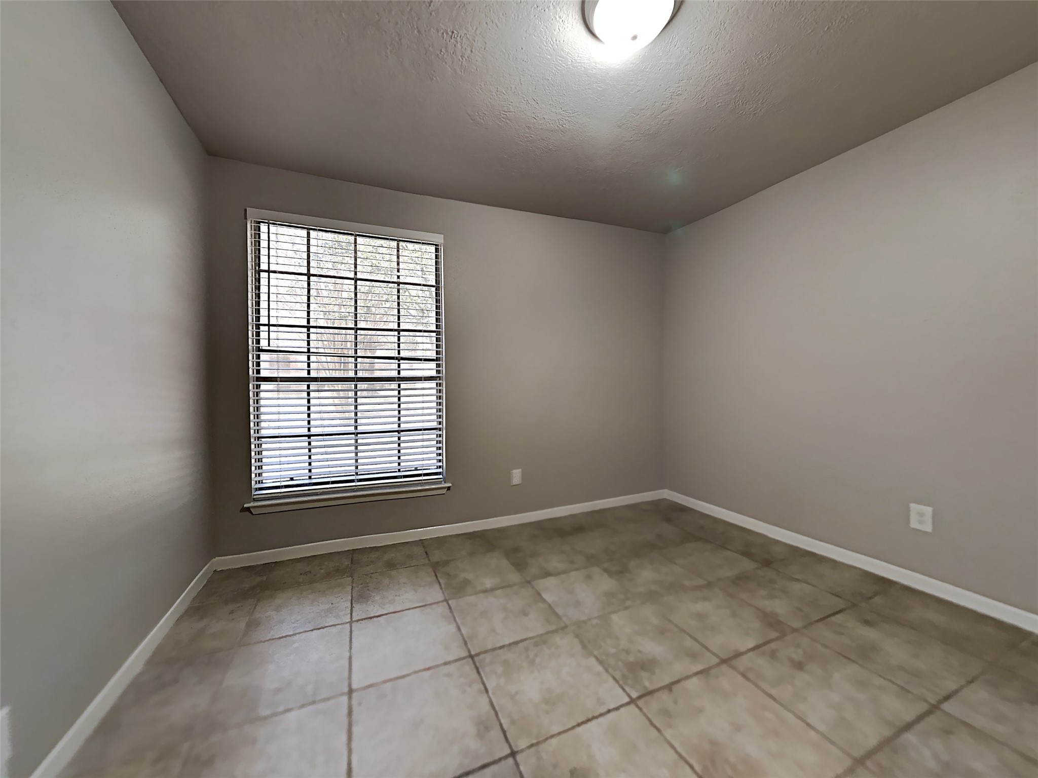23926 Spring Day Lane Spring, TX 77373 - Photo 16 of 19 an empty room with windows