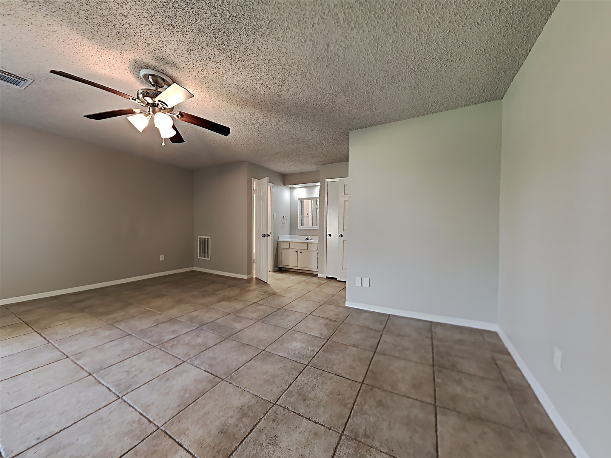 23926 Spring Day Lane Spring, TX 77373 - Photo 18 of 19 a view of an empty room and chandelier fan